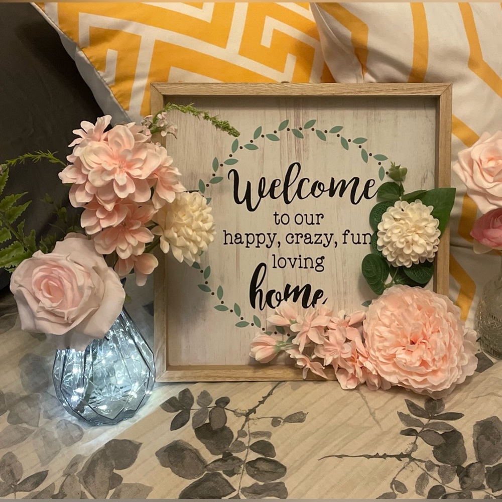 Frame and two decorative vases with fairy lights